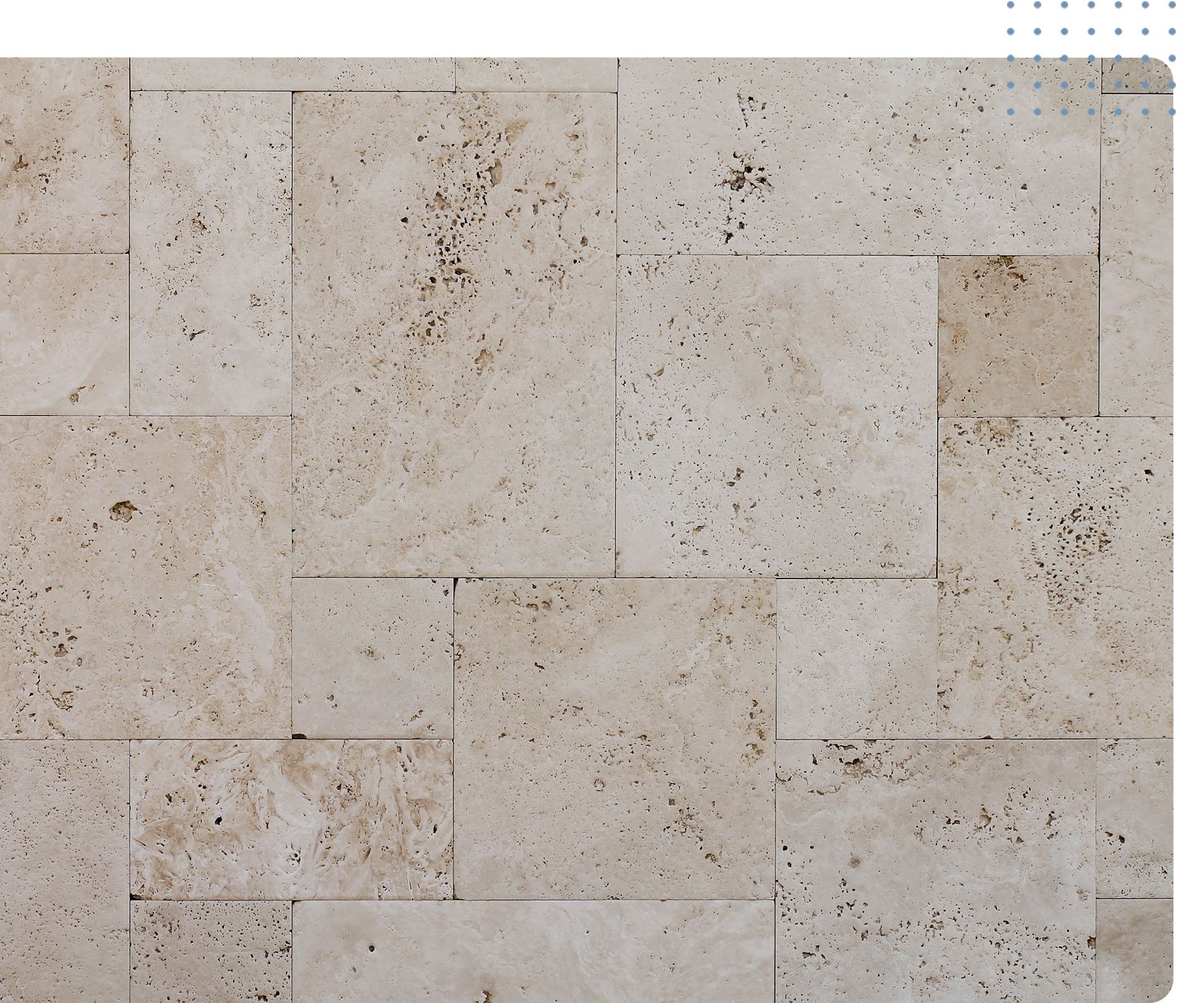 Natural travertine stone flooring with a light beige color and varying textures, showcasing polished and unpolished areas, relevant to professional stone polishing services in Las Vegas.