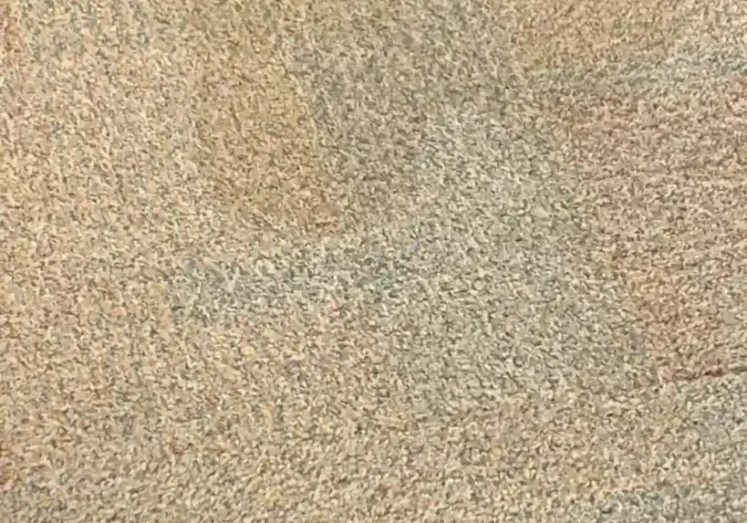 Closeup of textured carpet floor.